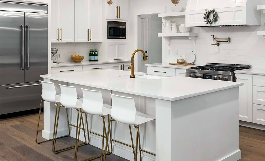 The image showcases a beautifully designed modern kitchen created using products available from Home Depot México. Stylish cabinets, durable countertops, a sleek stainless steel sink, contemporary faucet, energy-efficient appliances, elegant lighting, and practical storage solutions come together to create a functional and inviting cooking space. Warm wooden accents blend with modern finishes to deliver a clean, organized, and family-friendly environment. Decorative accessories, open shelving, and thoughtfully arranged workspaces highlight how quality home improvement products can transform an ordinary kitchen into a dream kitchen. The bright interior emphasizes comfort, convenience, and everyday usability while reflecting current kitchen design trends. This image represents the inspiration behind building a personalized kitchen with reliable Home Depot México products that combine style, durability, affordability, and practical functionality for every home renovation project.